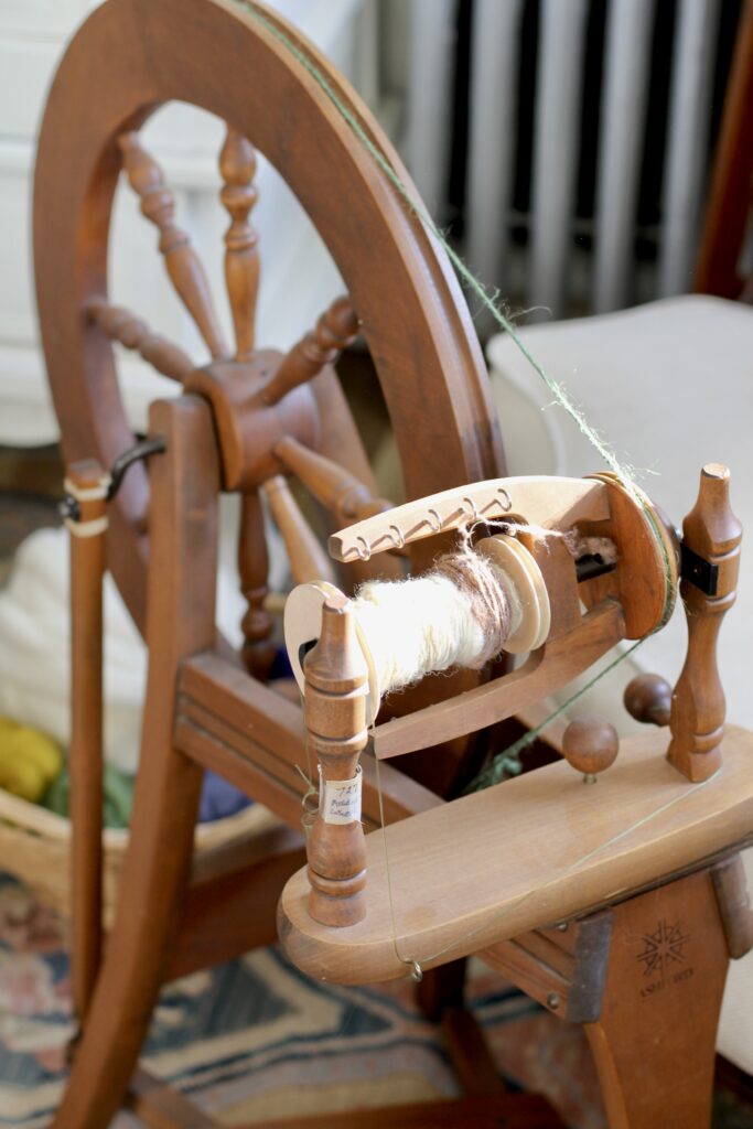 old fashioned loom in modern apartment